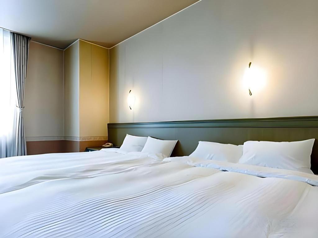 Smile Hotel Asahikawa Bagian luar foto