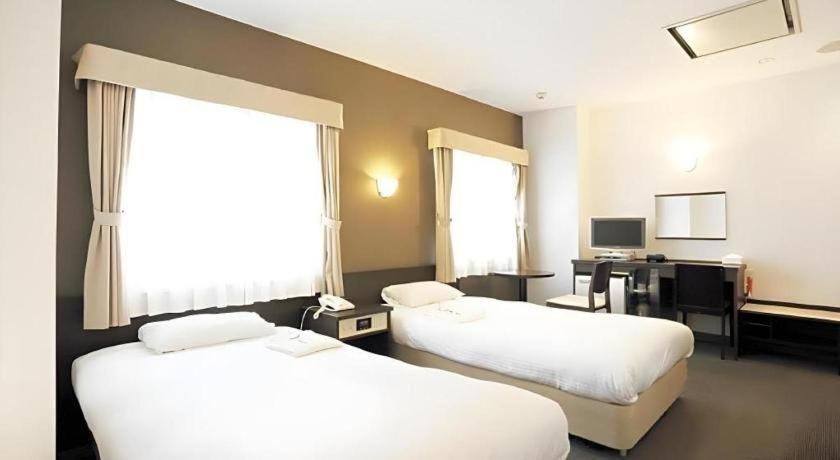 Smile Hotel Asahikawa Bagian luar foto